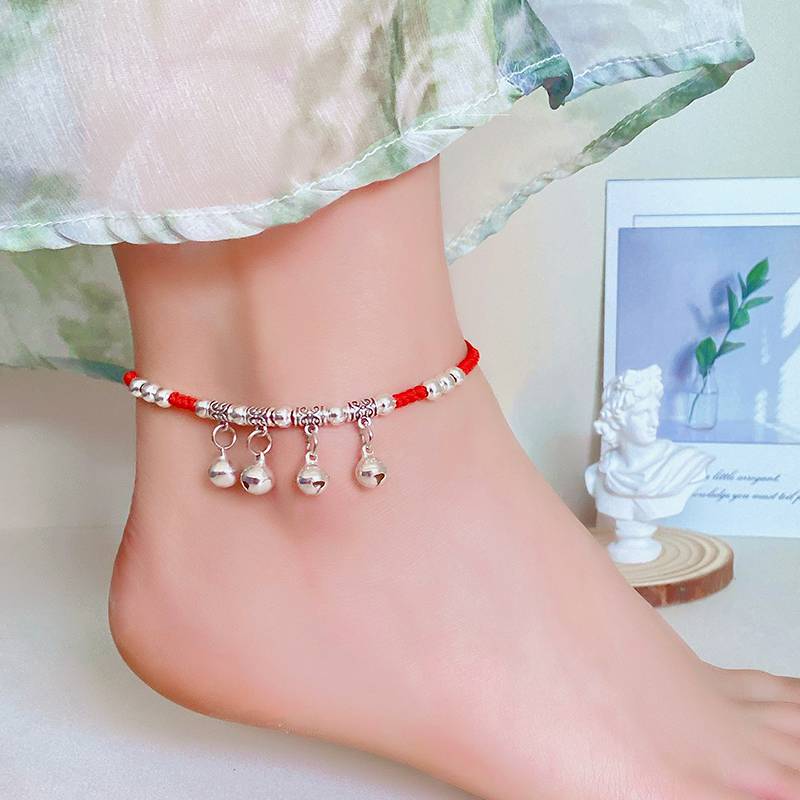 Four bell bracelets